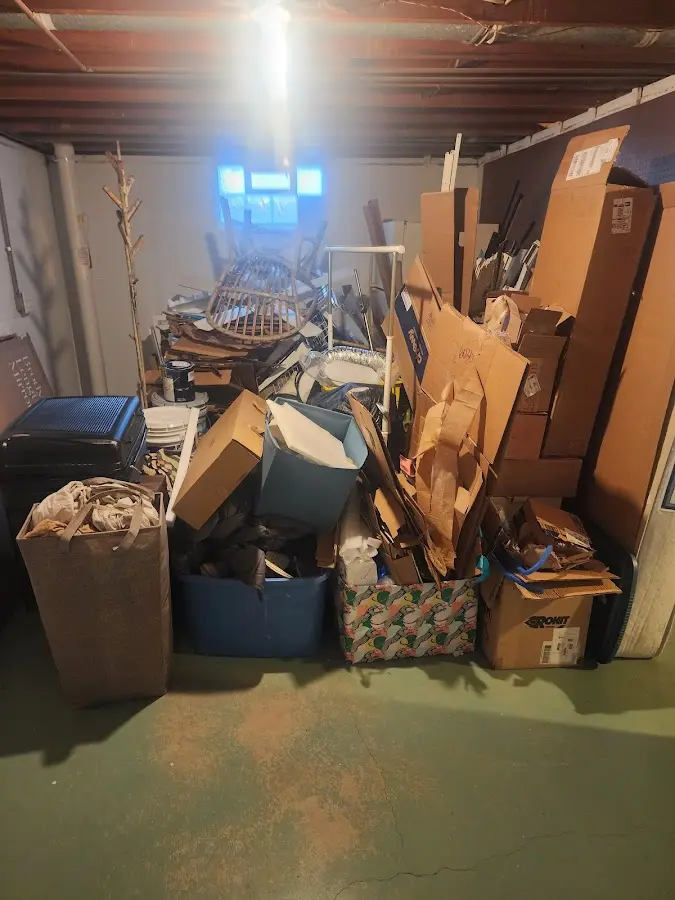 Roll-off dumpster container at job site for Construction Dumpster Rental in London Britain